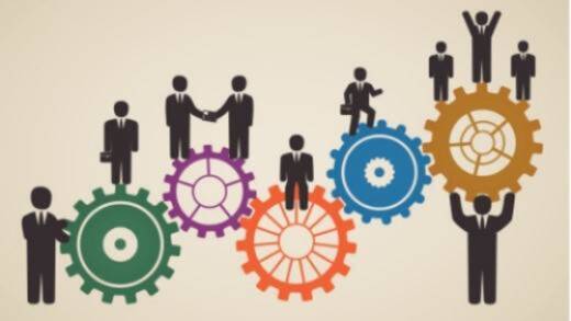 cartoon stick people standing on gears of varying heights representing different levels within an organization